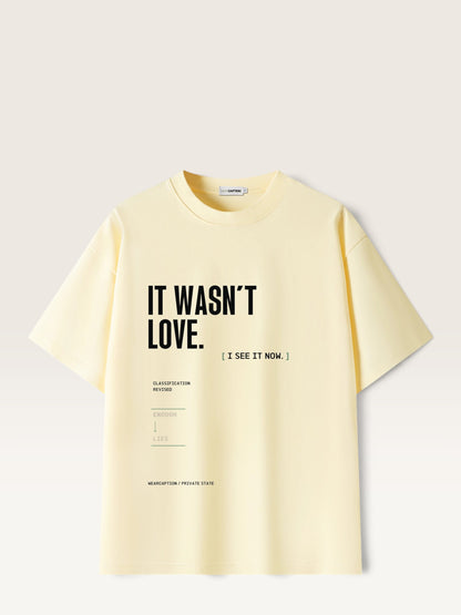 Apricot WEARCAPTION heavyweight cotton oversized t-shirt with white and green graphic text print on the back