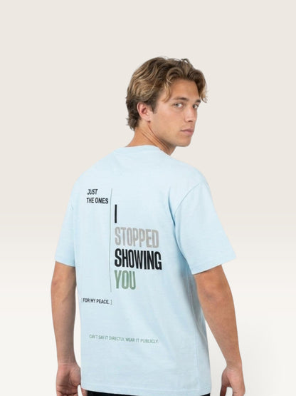 Sky Blue - heavyweight cotton oversized t-shirt with white NO HARD FEELINGS A LIE text print on the front