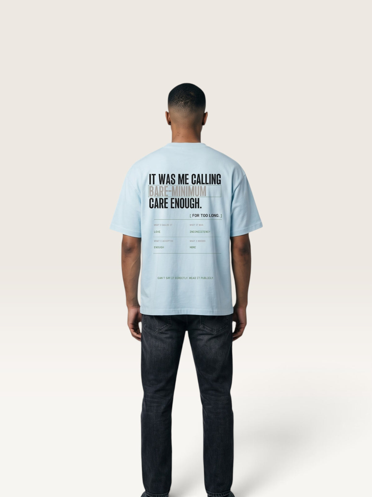 Sky Blue WEARCAPTION heavyweight cotton oversized t-shirt with white and green graphic text print on the back