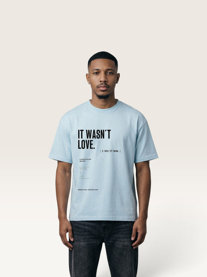 Sky Blue WEARCAPTION heavyweight cotton oversized t-shirt with white and green graphic text print on the back