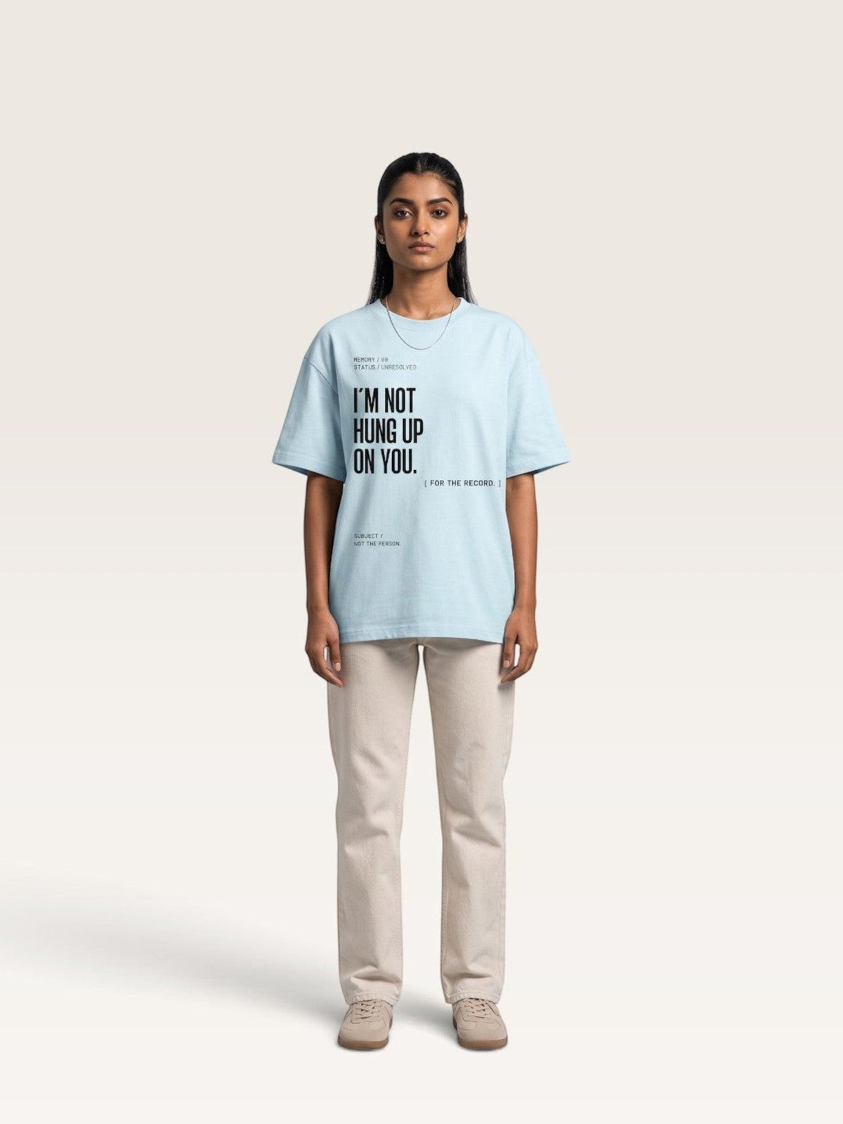 Sky Blue A model wearing a WEARCAPTION light blue oversized heavyweight cotton t-shirt with black text graphic on the front.
