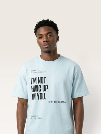 Sky Blue WEARCAPTION light blue heavyweight cotton oversized t-shirt with black text graphic on a male model