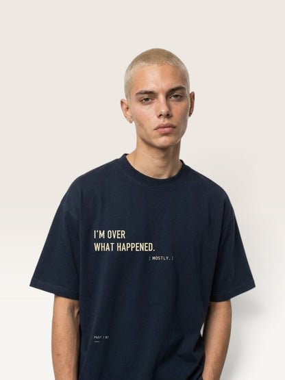WEARCAPTION navy heavyweight cotton oversized t-shirt with I'M OVER WHAT HAPPENED text print on chest