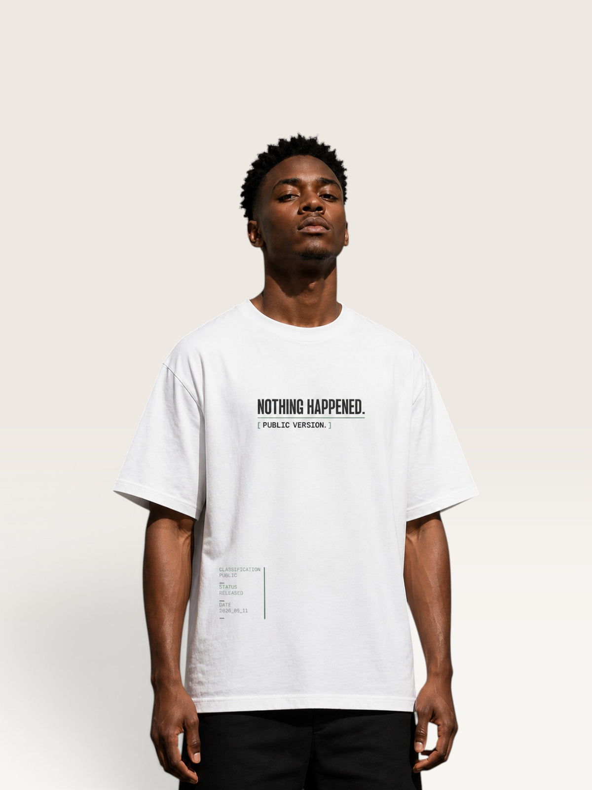 White WEARCAPTION  heavyweight cotton oversized t-shirt with NOTHING HAPPENED PUBLIC VERSION graphic print