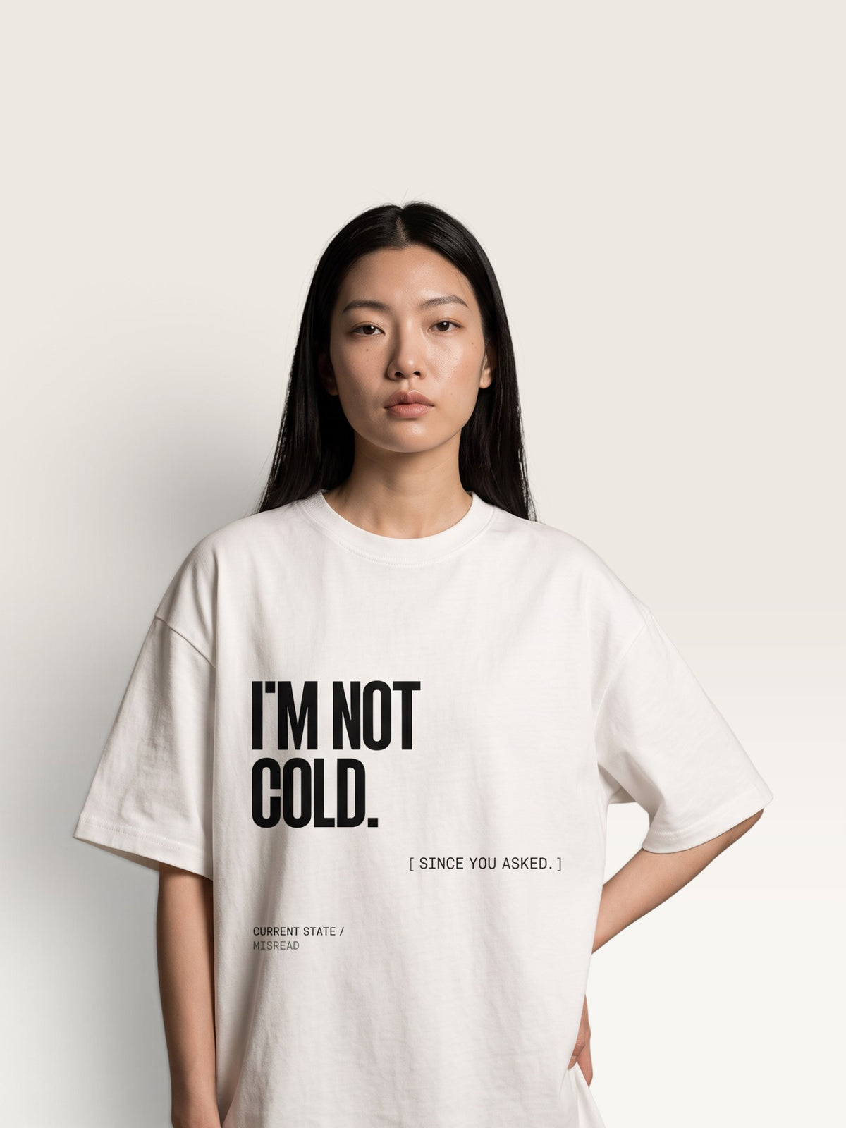 White WEARCAPTION heavyweight cotton oversized t-shirt with white I'M NOT COLD graphic print on the chest.