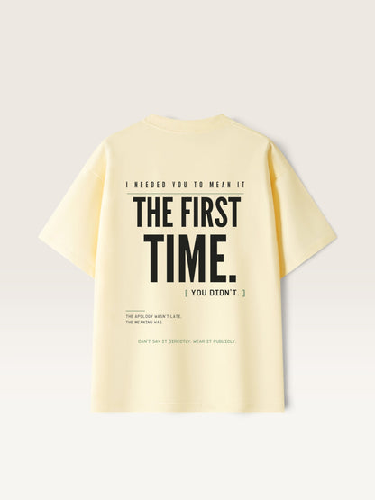 Apricot WEARCAPTION heavyweight pale yellow cotton t-shirt with black typographic back print featuring bold text design.