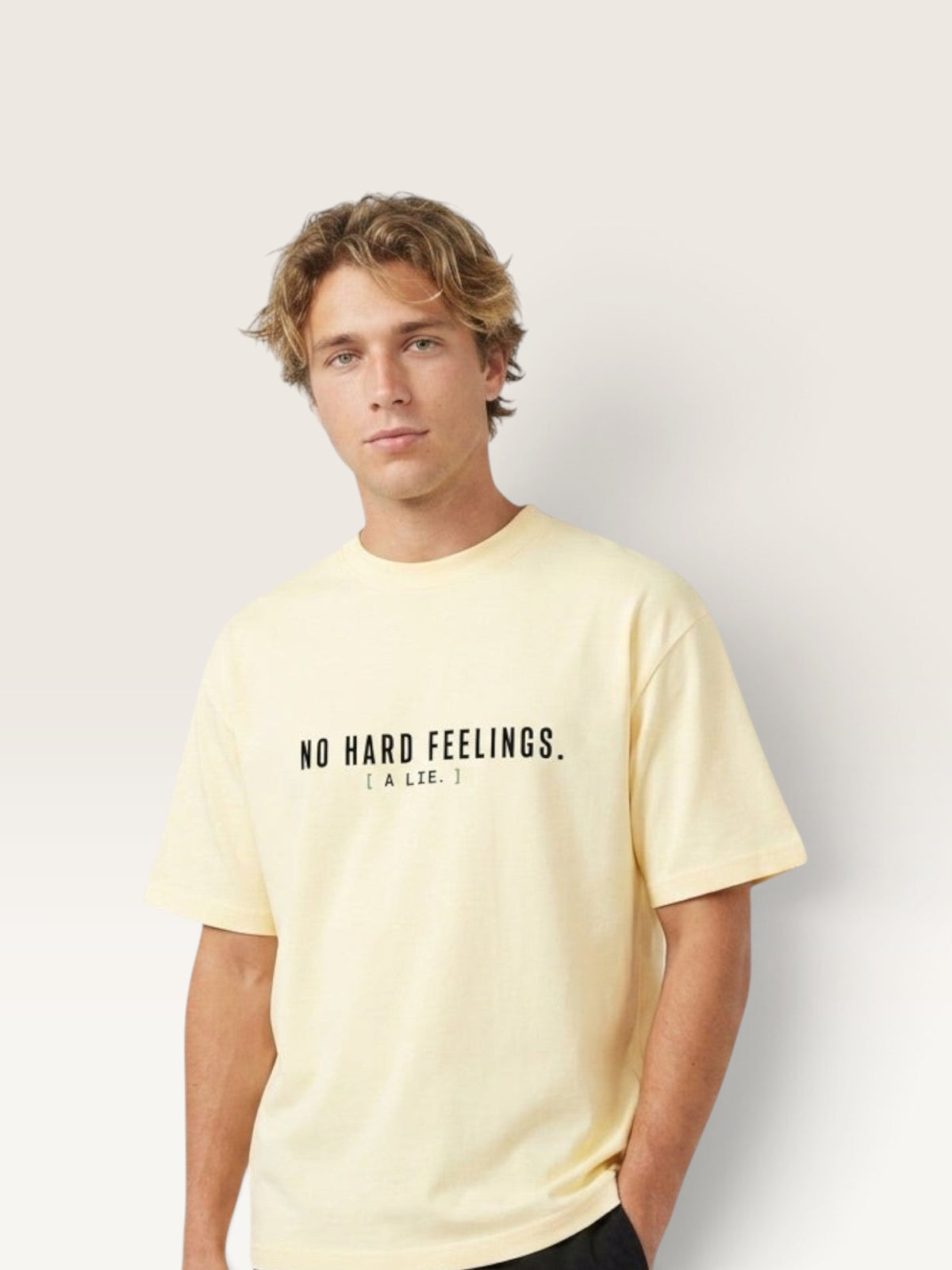 Apricot - heavyweight cotton oversized t-shirt with white NO HARD FEELINGS A LIE text print on the front