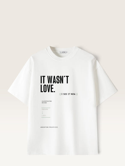 White WEARCAPTION heavyweight cotton oversized t-shirt with white and green graphic text print on the back