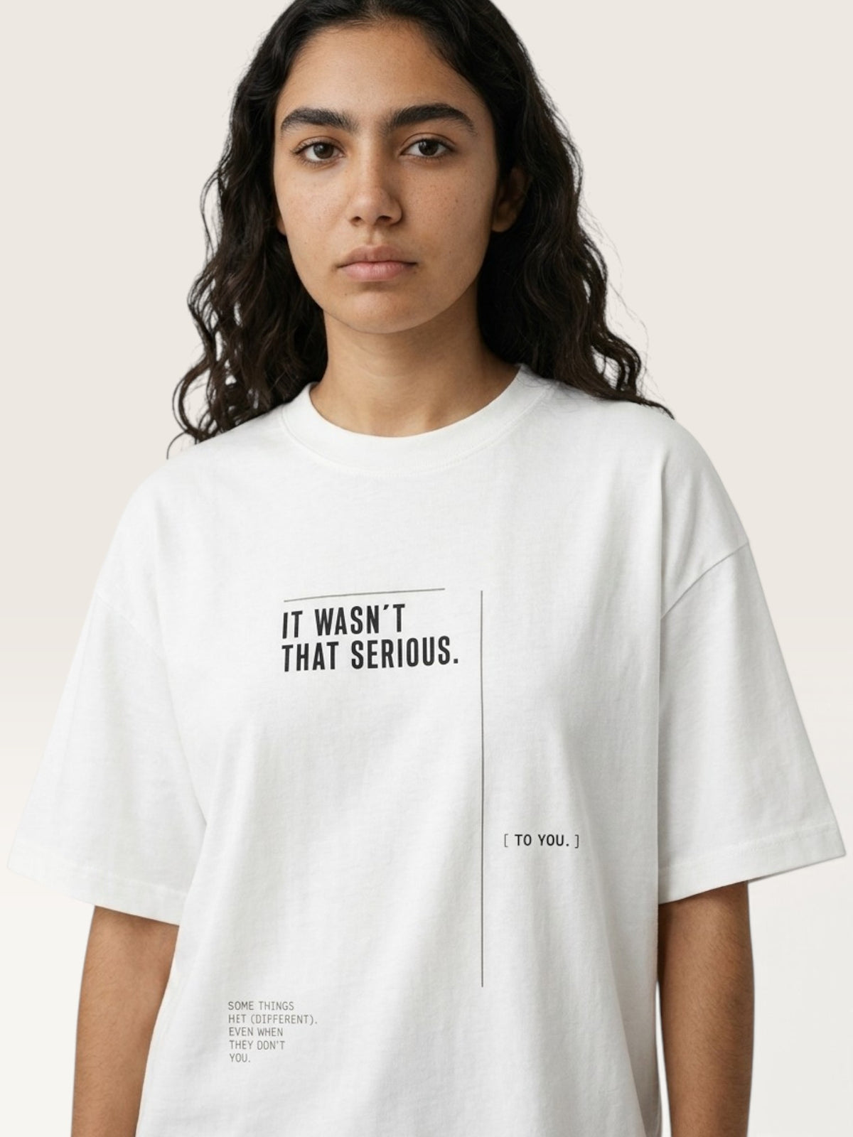White WEARCAPTION white heavyweight cotton oversized t-shirt with black IT WASN'T THAT SERIOUS text on the front
