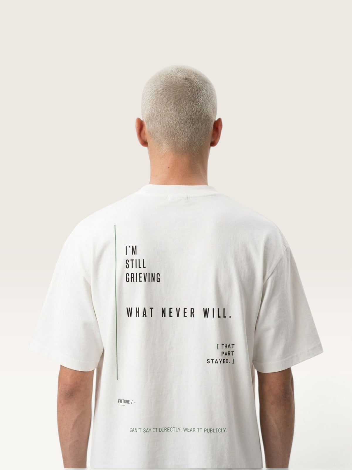 WEARCAPTION heavyweight white cotton t-shirt with black text on the back, featuring an oversized boxy fit.