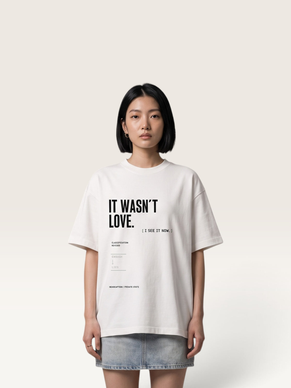White WEARCAPTION heavyweight cotton oversized t-shirt with white and green graphic text print on the back