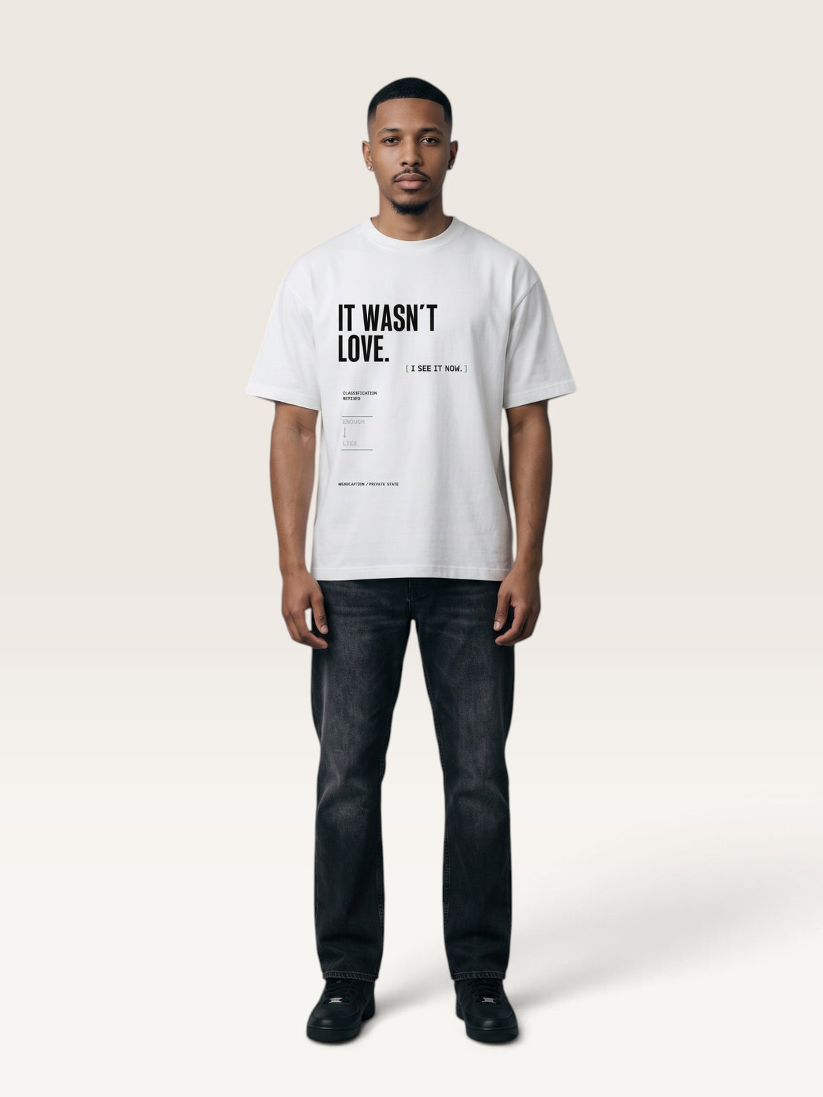 White WEARCAPTION heavyweight cotton oversized t-shirt with white and green graphic text print on the back
