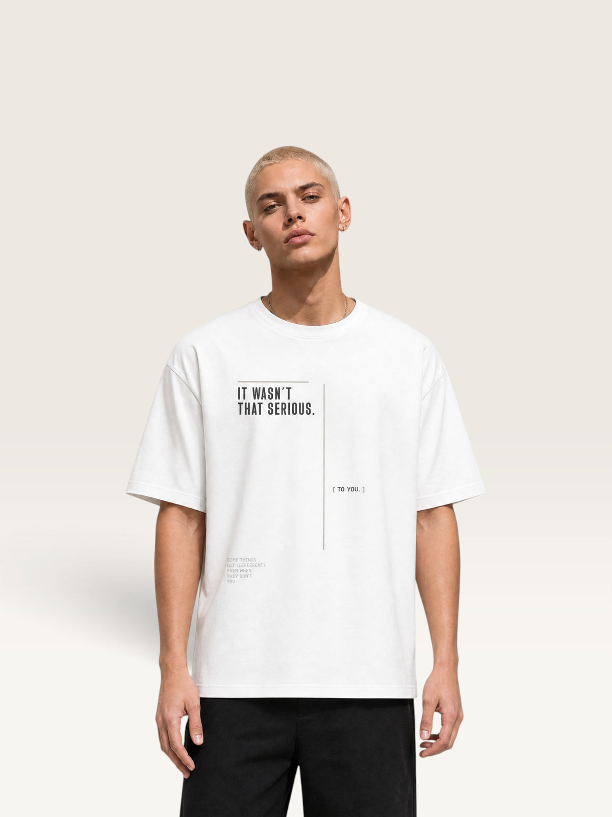 White WEARCAPTION white heavyweight cotton oversized t-shirt with black IT WASN'T THAT SERIOUS graphic print on the chest