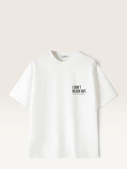 White WEARCAPTION  heavyweight cotton oversized t-shirt with white I DON'T REACH OUT graphic print on the chest