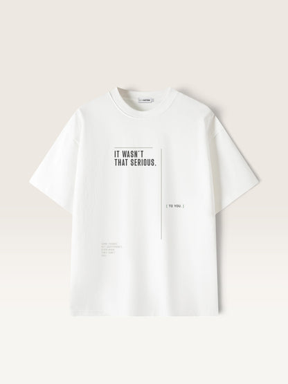White WEARCAPTION white heavyweight cotton oversized t-shirt with black IT WASNT THAT SERIOUS graphic print on the front