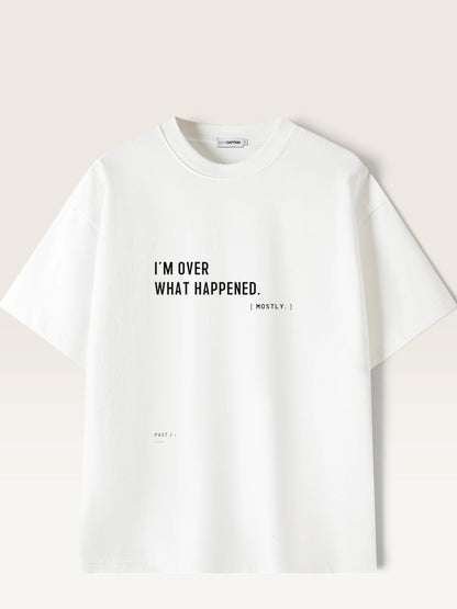 WEARCAPTION white heavyweight cotton oversized t-shirt with black text I'M OVER WHAT HAPPENED printed on the front
