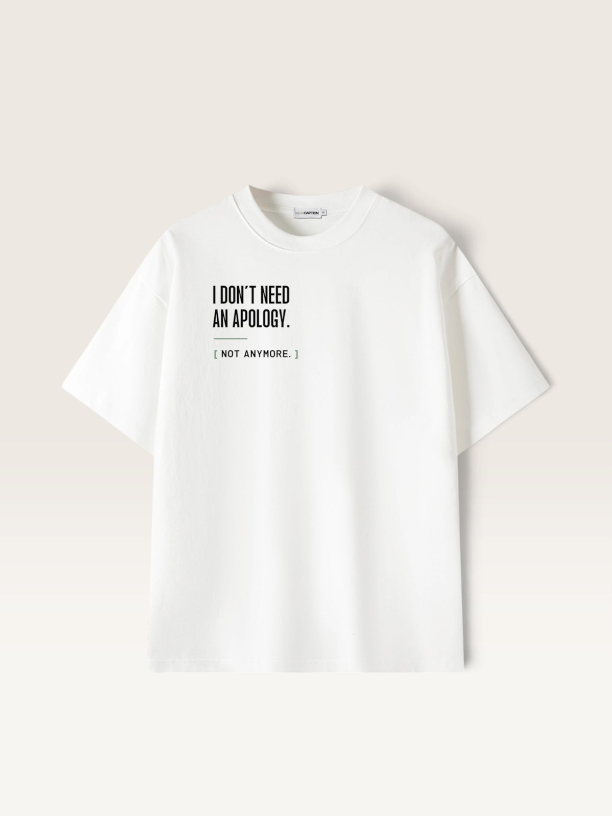 White WEARCAPTION white heavyweight cotton oversized t-shirt with I DON'T NEED AN APOLOGY graphic print on the chest.